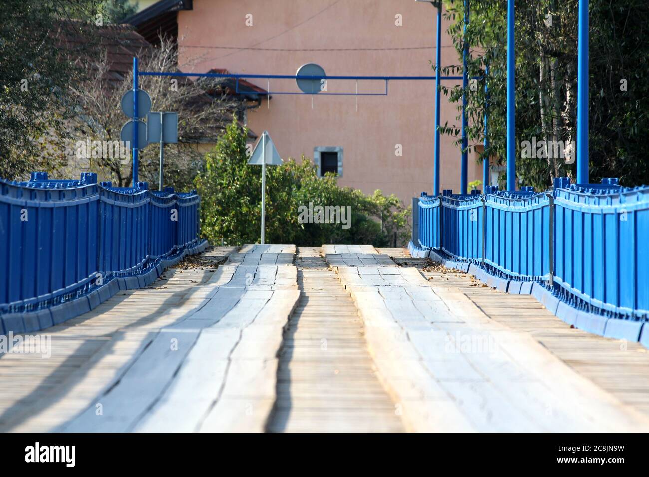 Metal bridge surrounded trees hi-res stock photography and images - Alamy