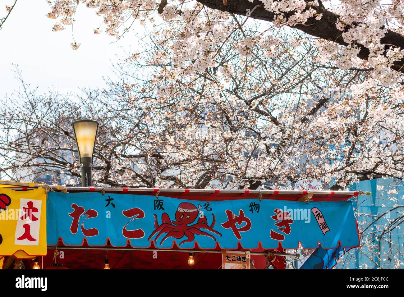 Osaka, Japan - CIRCA April, 2019 : Japanese street food stalls at Osaka castle cherry blossoms festival Stock Photo