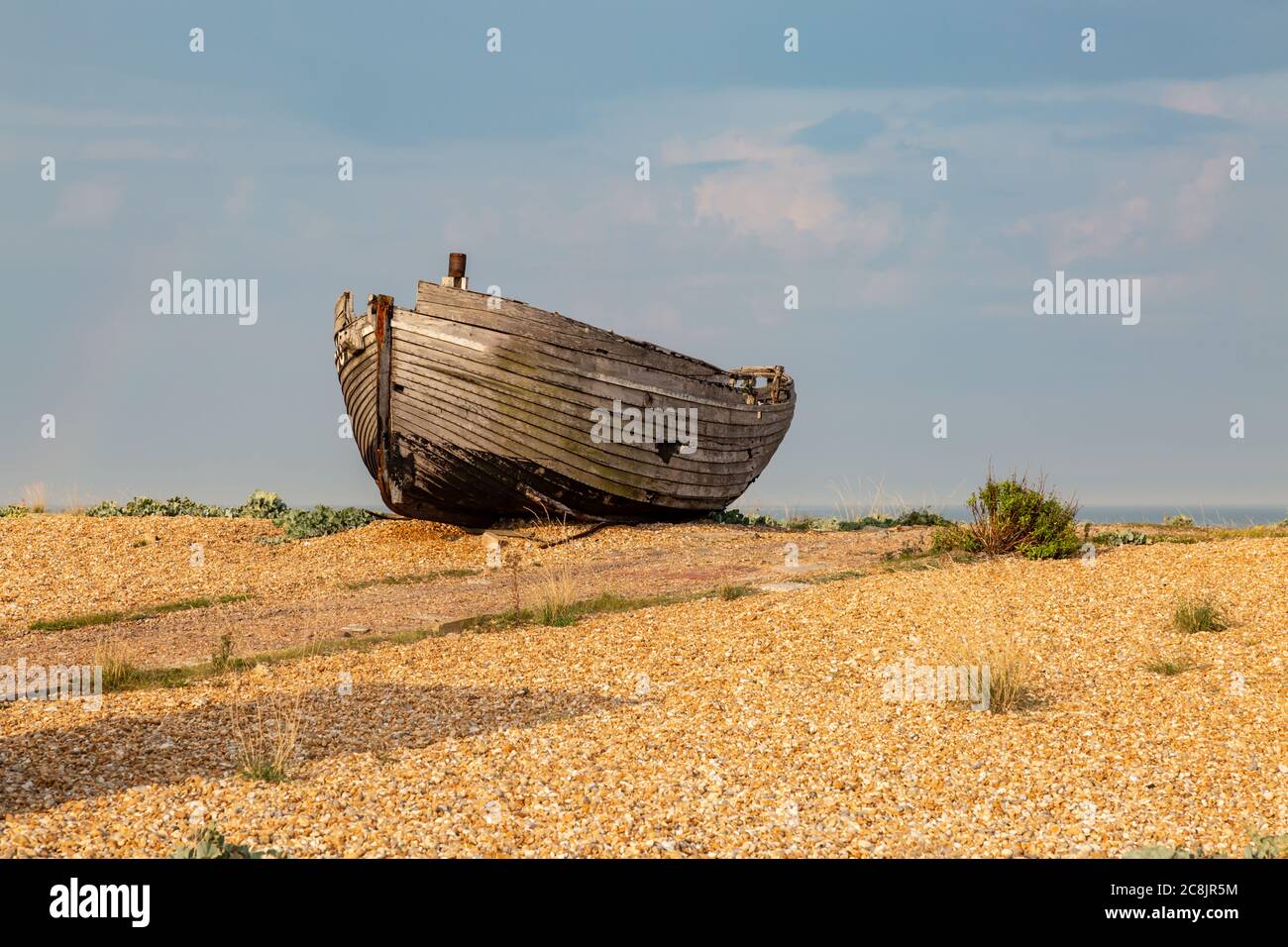 An old fishing boat on a pebble beach in Kent Stock Photo - Alamy