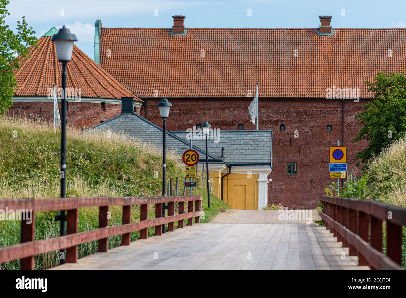 The bridge crossing the moat protecting an old castle in Landskrona, southern Sweden. The castle was initially built by Christian III of Denmark 1549–1559 as a fortification with two complete moats Stock Photo