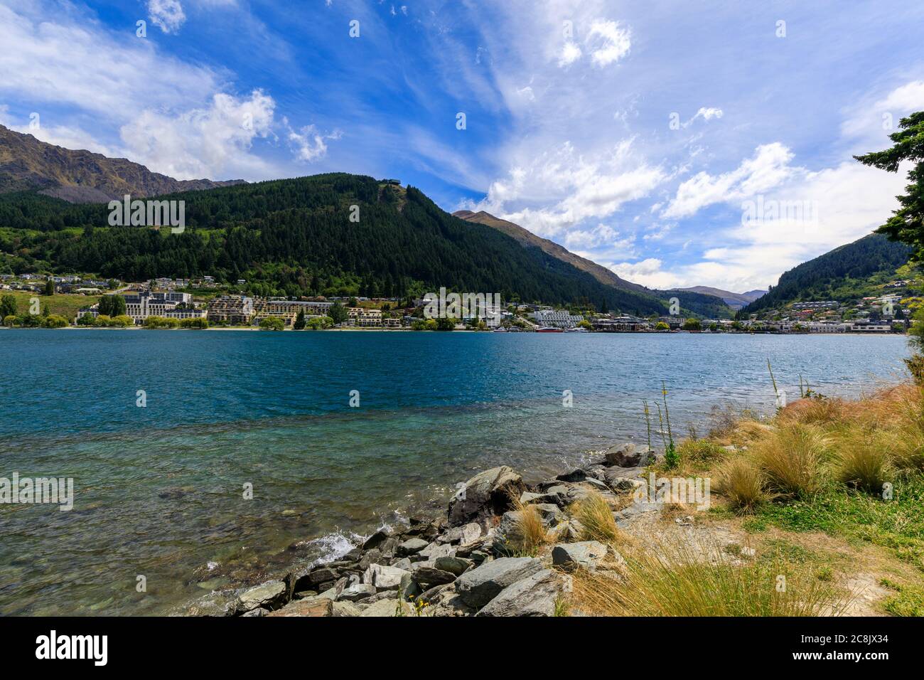 The view from the City Park towards Queenstown, New Zealand, on a blue sky day Stock Photo