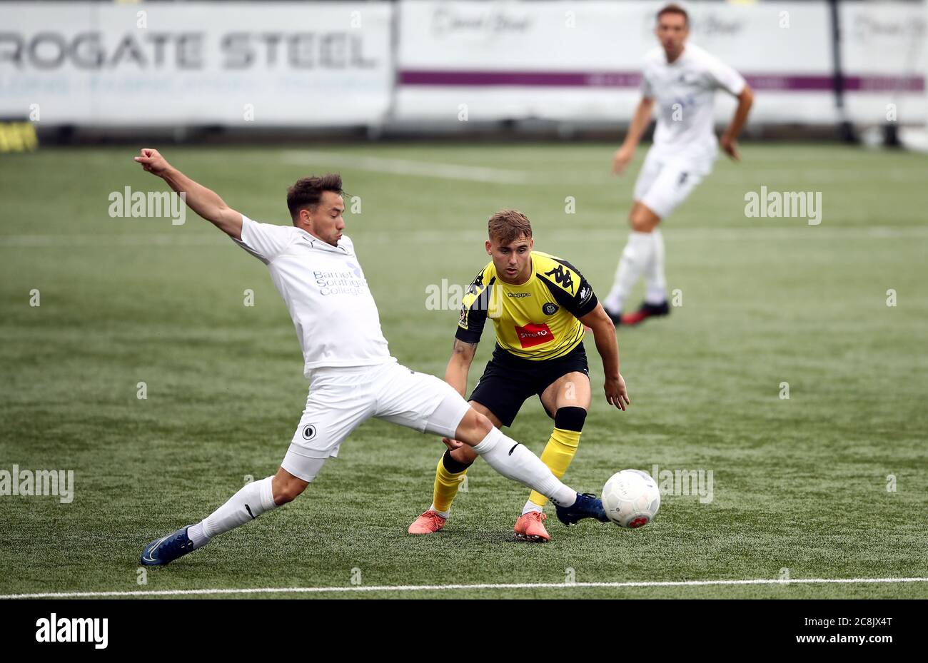 Harrogate Town’s Jack Diamond (right) and Boreham Wood’s Kane Smith battle for the ball during the Vanarama National League play-off semi final match at CNG Stadium, Harrogate. Stock Photo