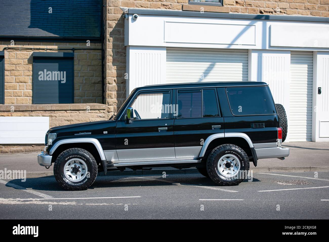 1993 Toyota Land Cruiser Prado parked on a suburban English street Stock Photo