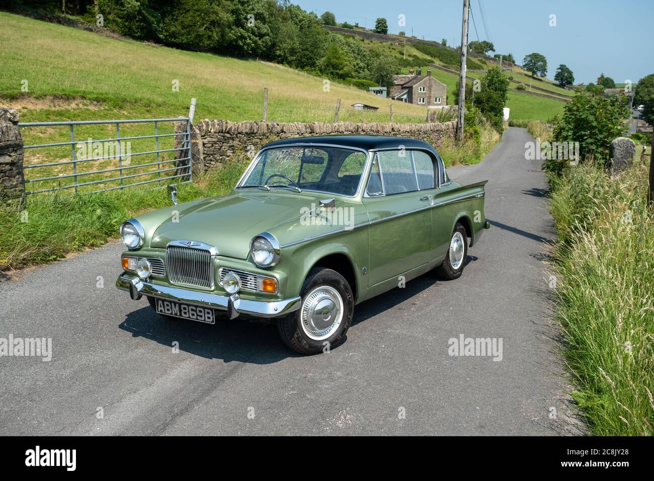 1964 Sunbeam Rapier MkIV parked omn a country lane in the sunshine above Holmfirth, West Yorkshire, England Stock Photo