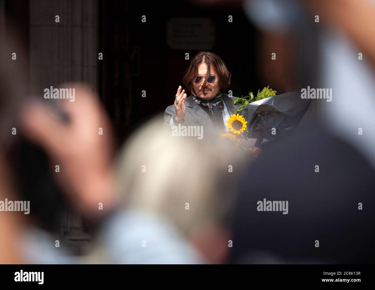 Hollywood actor and musician Johnny Depp arrives at the high court, on day 13 of his libel trial against The Sun's publishers NGN Stock Photo