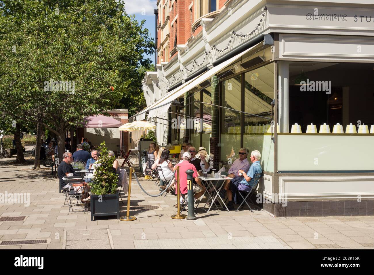 Al-fresco dining outside Olympic Studios cinema and cafe, Church Road, Barnes, London, SW13, U.K. Stock Photo