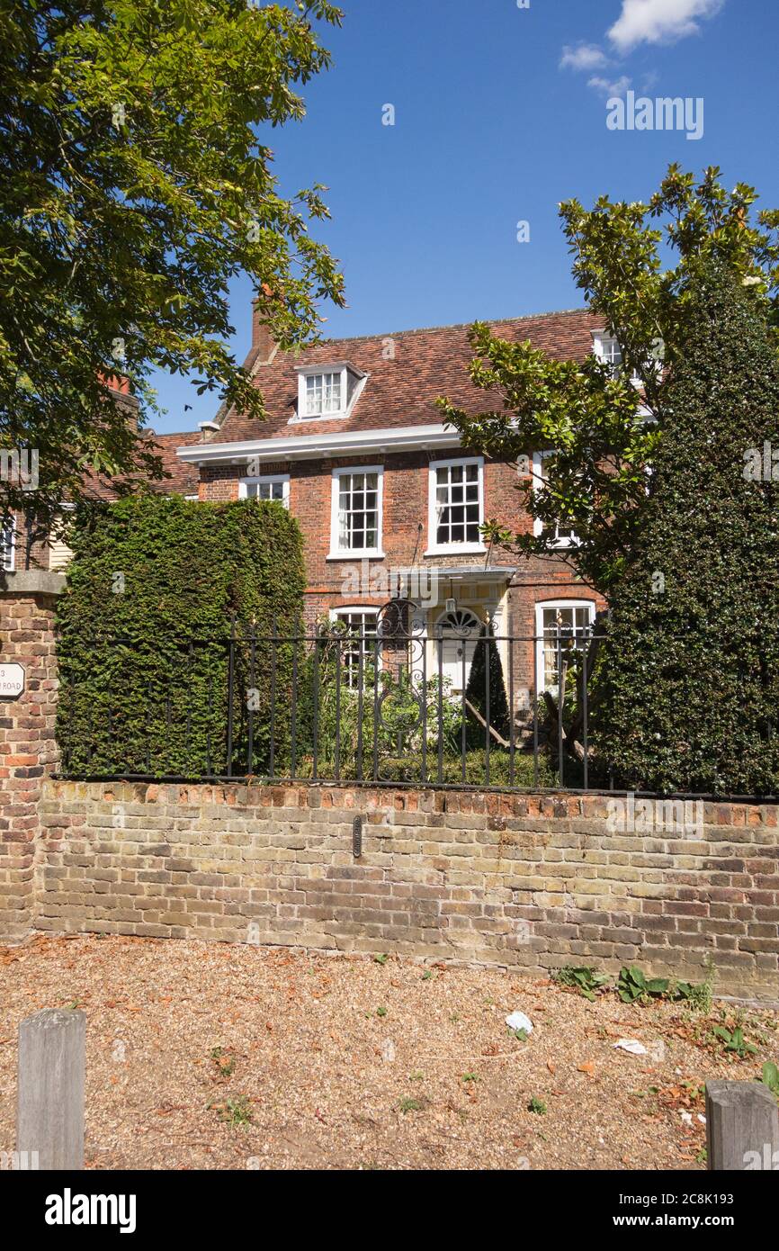 A Row of Brick Buildings with Black Doors on a Street in London Stock Image  - Image of architecture, english: 189002149