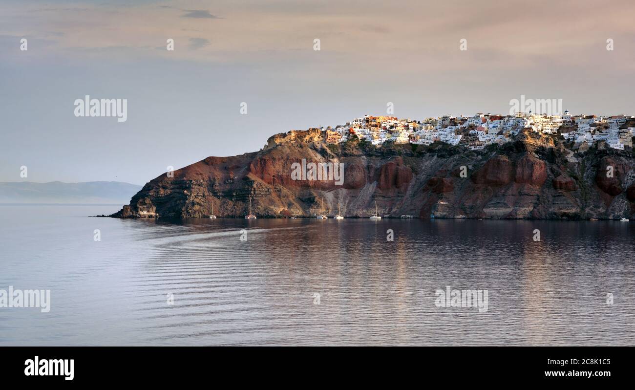 Oya island and village viewed from the sea. Santorini, Greece Stock Photo