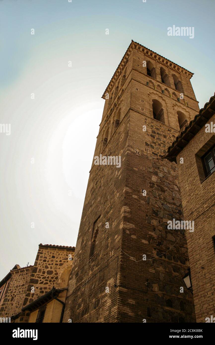 Toledo, Castilla-La Mancha, Spain, Europe. Mudéjar tower inlaid with glazed ceramic of the church of Santo Tomé (12th century). Stock Photo