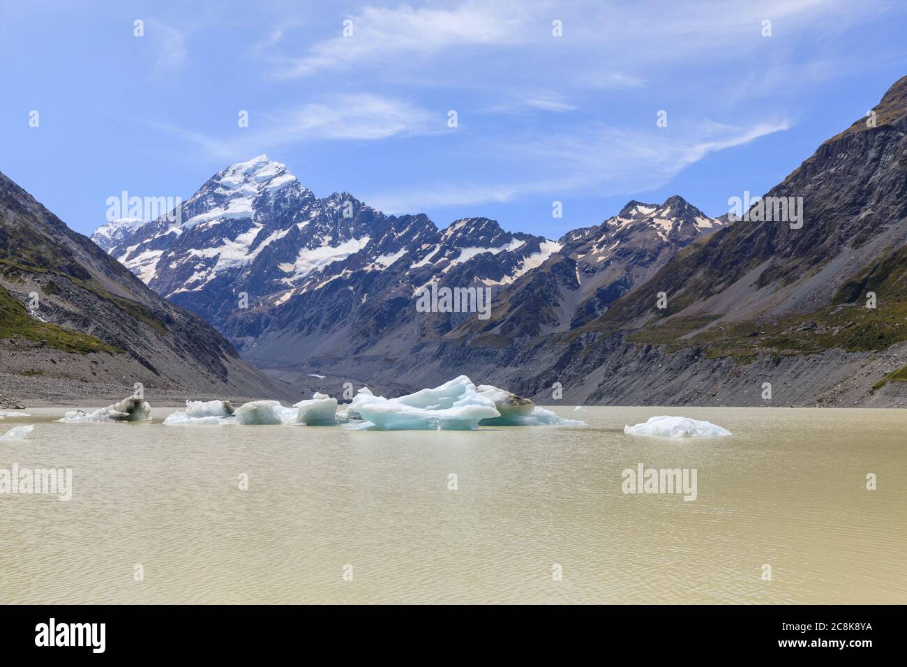 Hooker Lake in the foreground with Glacial ice floating in it and Mt Cook beyond it. Stock Photo