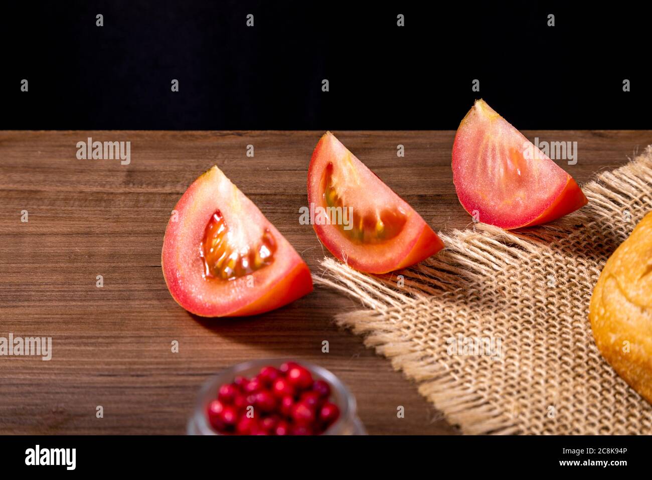 grains of red peppe with cherry tomatoes. Stock Photo