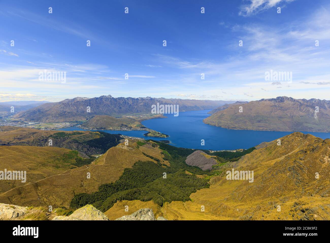 The view from the saddle of Ben Lomond over Queenstown and Lake Wakatipu. Otago, Queenstown, New Zealand. Stock Photo