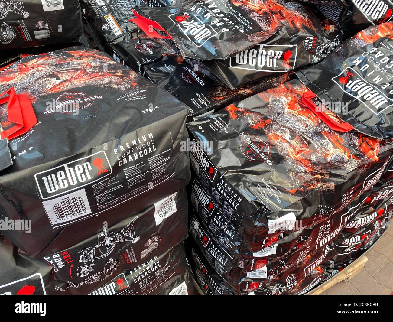 Venlo, Netherlands July 9. 2020 View on isolated stack er grill barbecue charcoal bags in