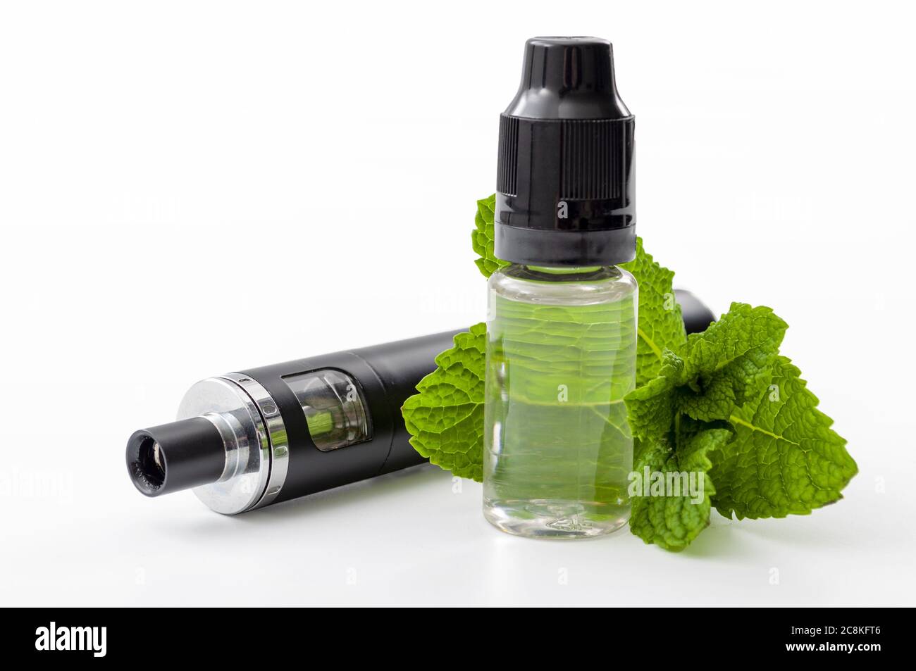 Alternative to cigarette smoking, quit cigarettes and cancer preventing technology mint flavoured vape juice concentrate and electric vaping pen isola Stock Photo