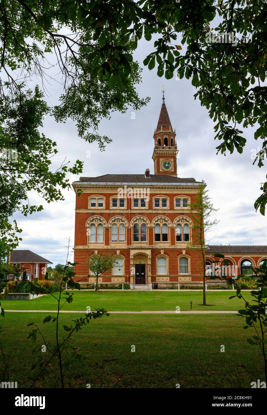 Dulwich College boys school. View of the South Block (one of the Barry Buildings) with clock tower seen through trees. Dulwich is in south London. Stock Photo