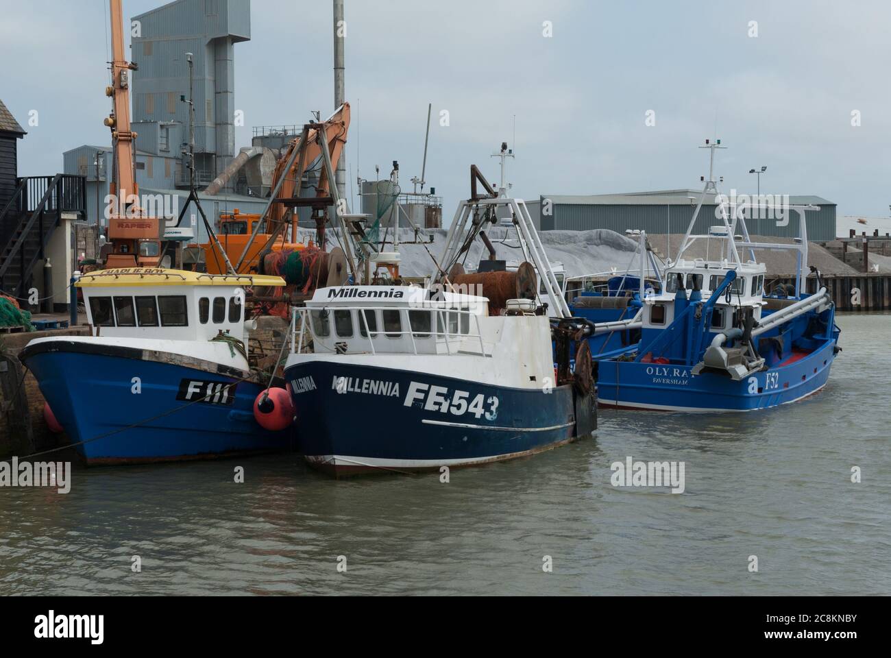 Fishing boats tied up in Whitstable harbour, Kent Stock Photo - Alamy