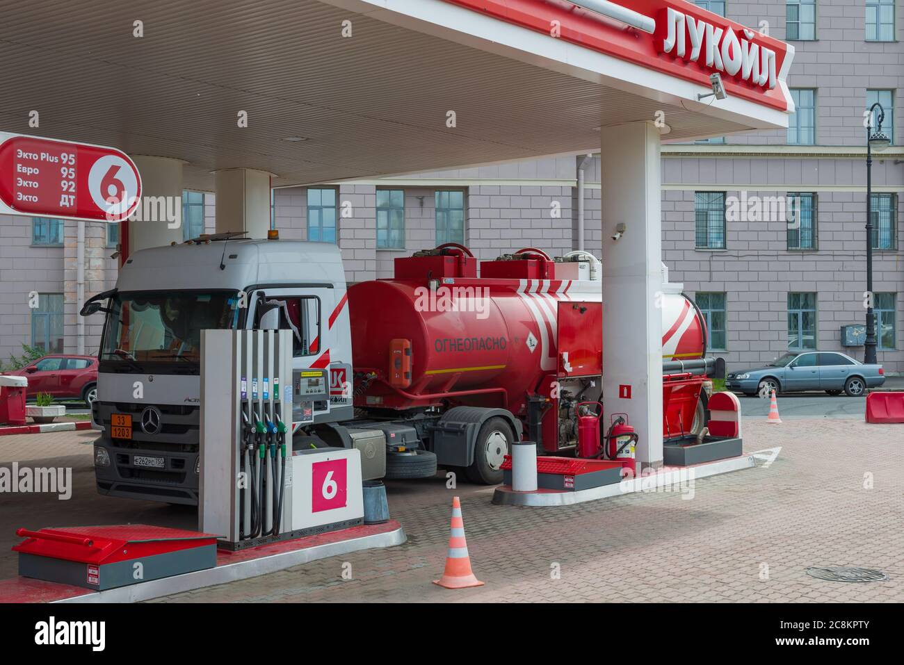 ST. PETERSBURG, RUSSIA - JULY 03, 2020: A fuel truck drains fuel at a car filling station Stock Photo