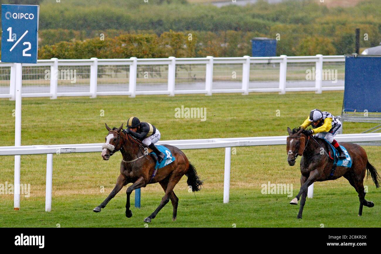 Table Mountain ridden by jockey Raul Da Silva (left) on their way to win the John Guest Brown Jack Handicap Stakes at Ascot Racecourse. Stock Photo