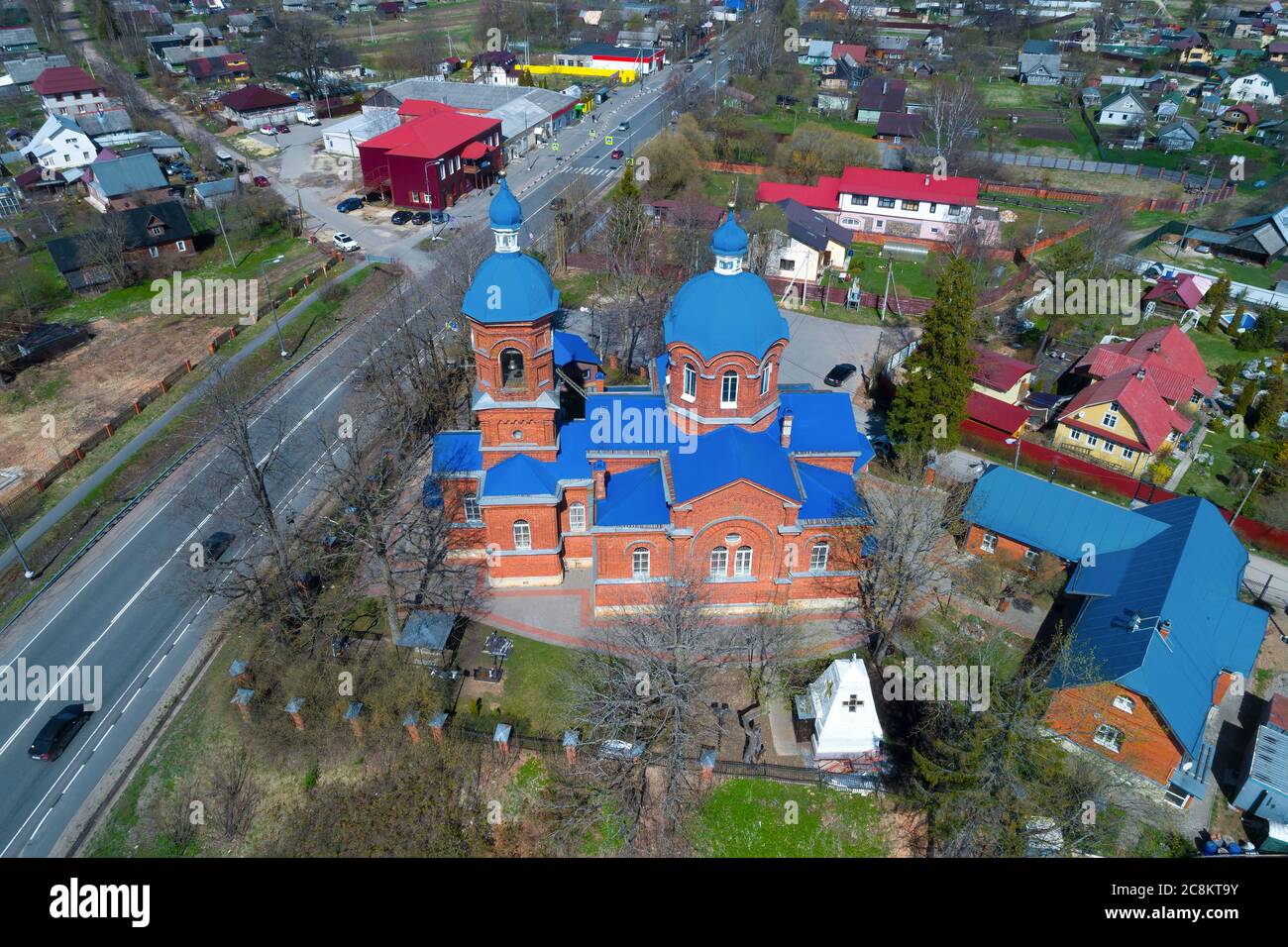 Over the Church of the Nativity of the Blessed Virgin Mary on a sunny May day (aerial photography). Rozhdestveno, Leningrad region. Russia Stock Photo