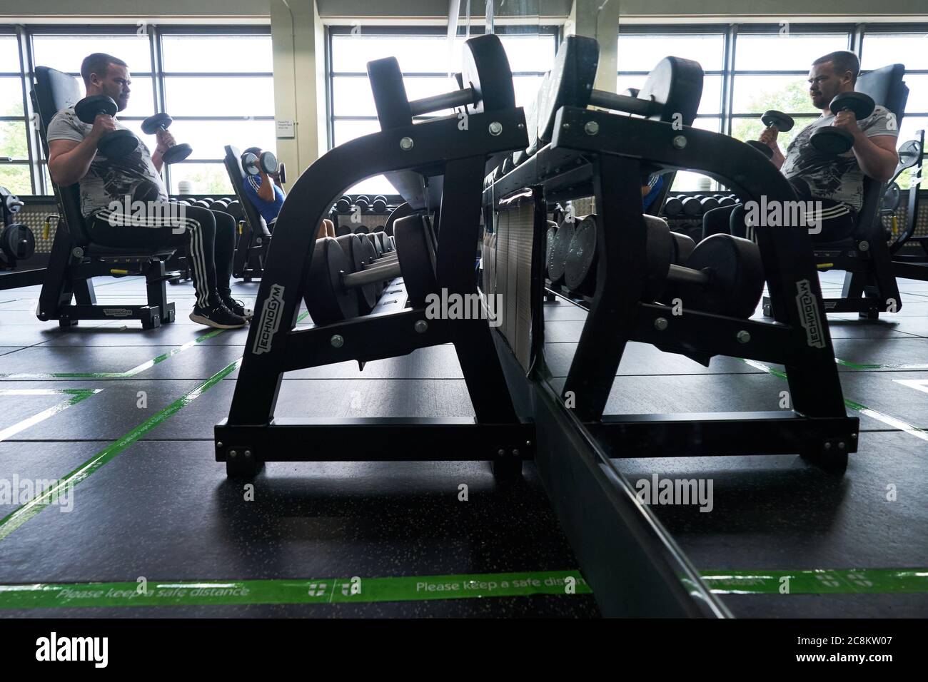 Gym members exercise nuffield health sunbury gym hi res stock