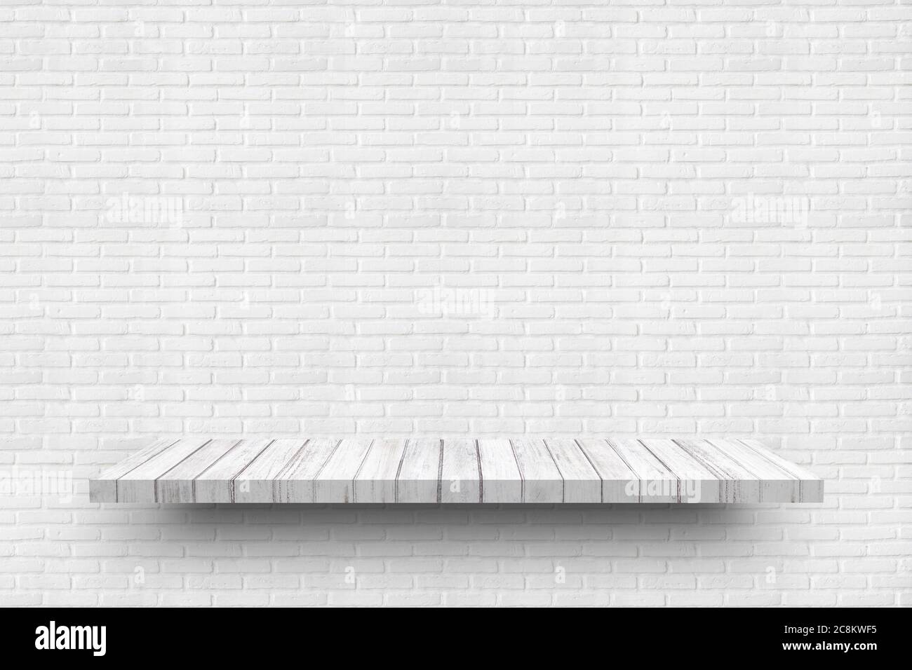 Empty white wooden shelf on old white brick wall background texture for display products Stock