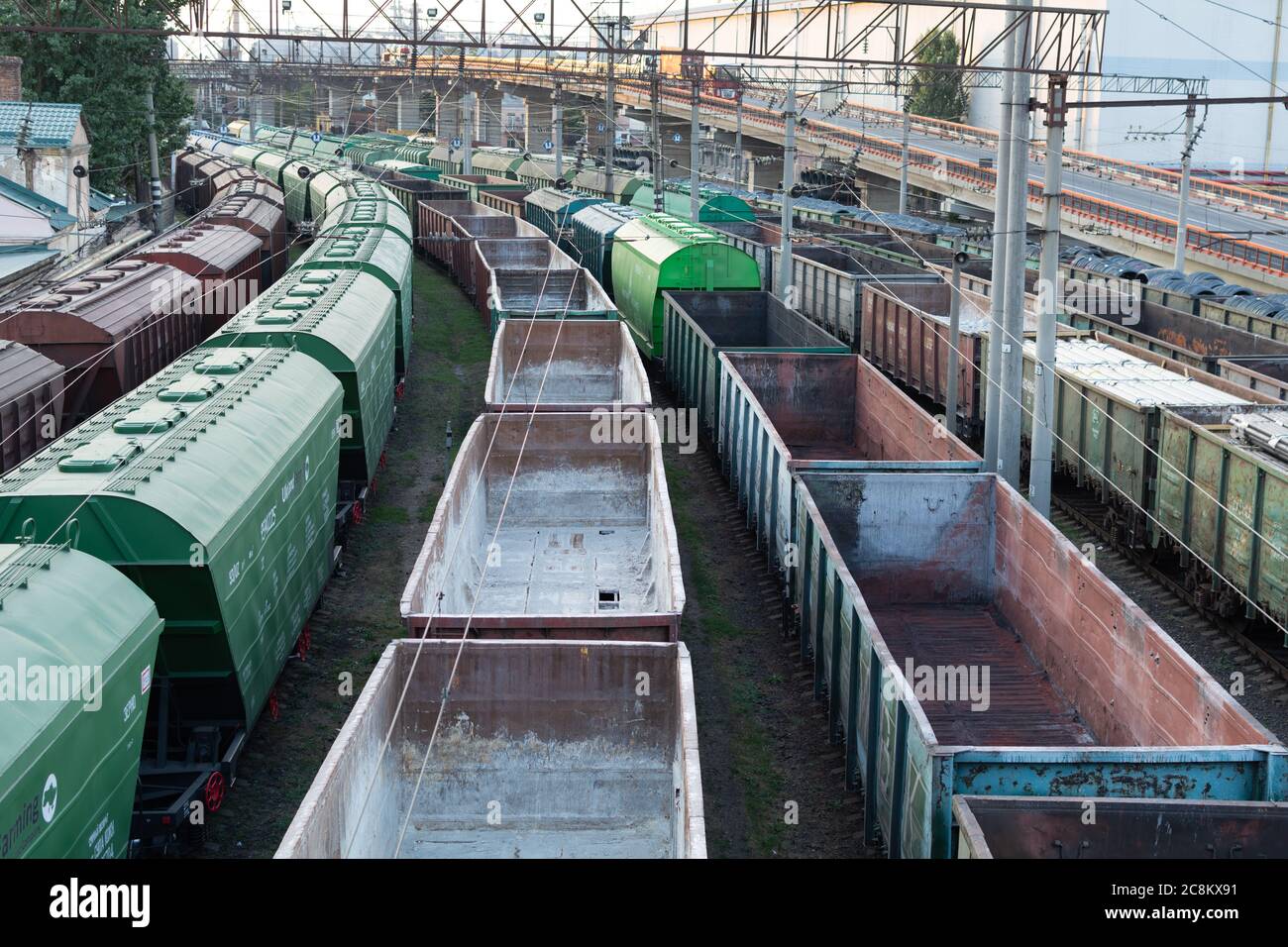 Top view of rail sorting freight station with freight cars, with many rail tracks railroad. Heavy industry landscape. Stock Photo