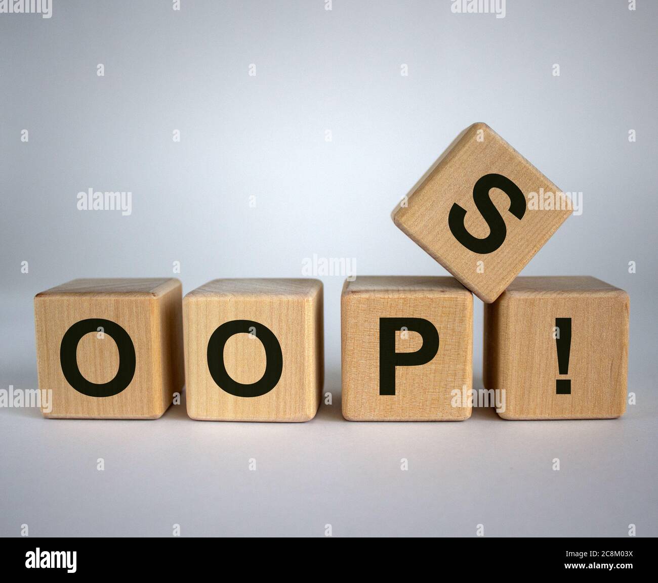 oops in Images High Quality Grahic Oops sign on wooden cubes. Beautiful white background, copy space ...