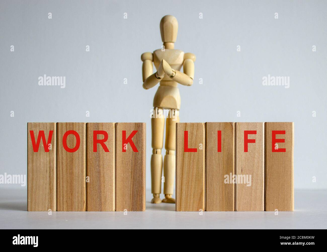 Wooden blocks with words 'work life'. Wooden model of human Stock Photo ...