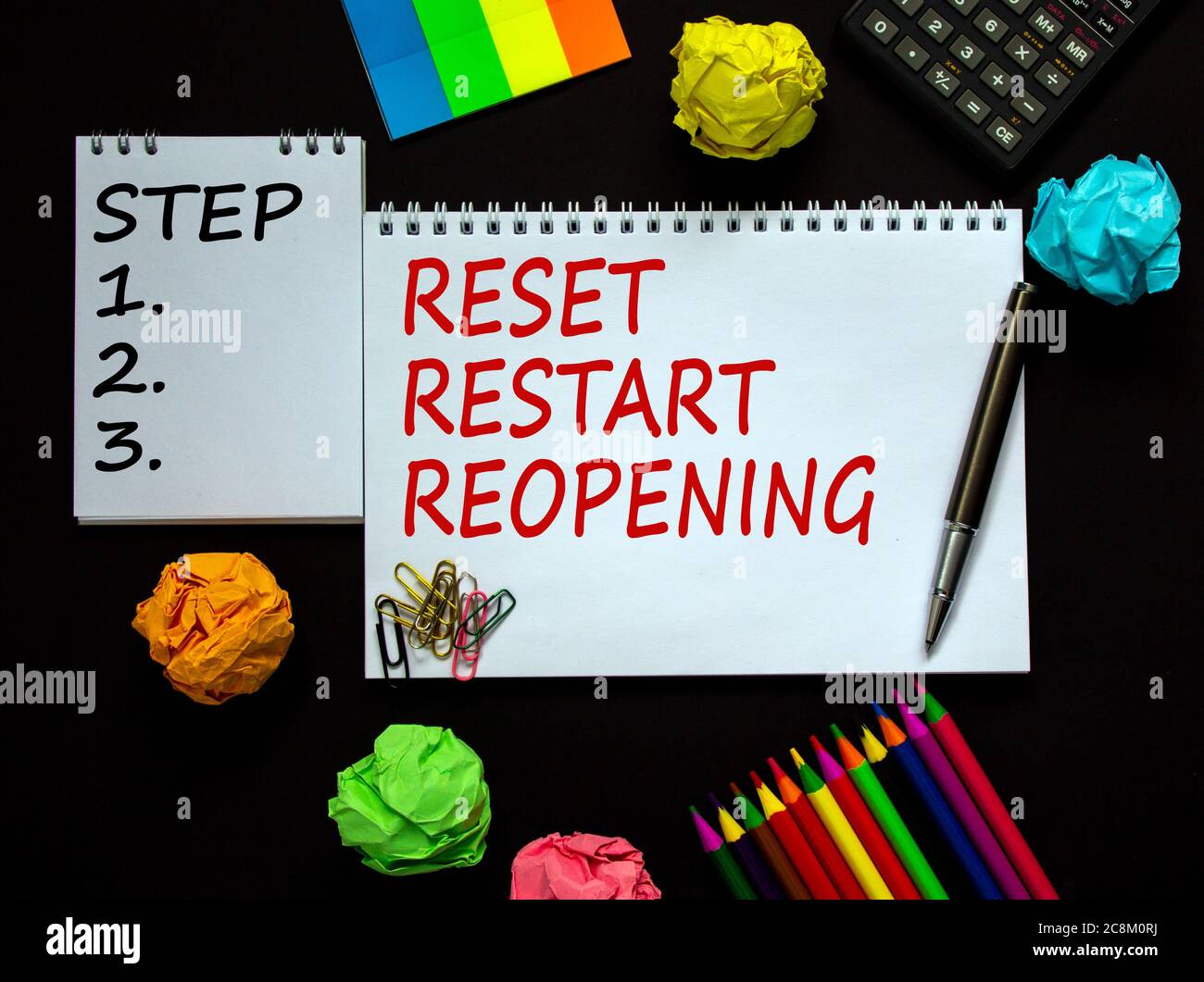 White notes with inscription 'reset, restart, reopening' and 'step 1, 2, 3'  on beautiful black table, colored paper, colored pencils, paper clips, pen  Stock Photo - Alamy