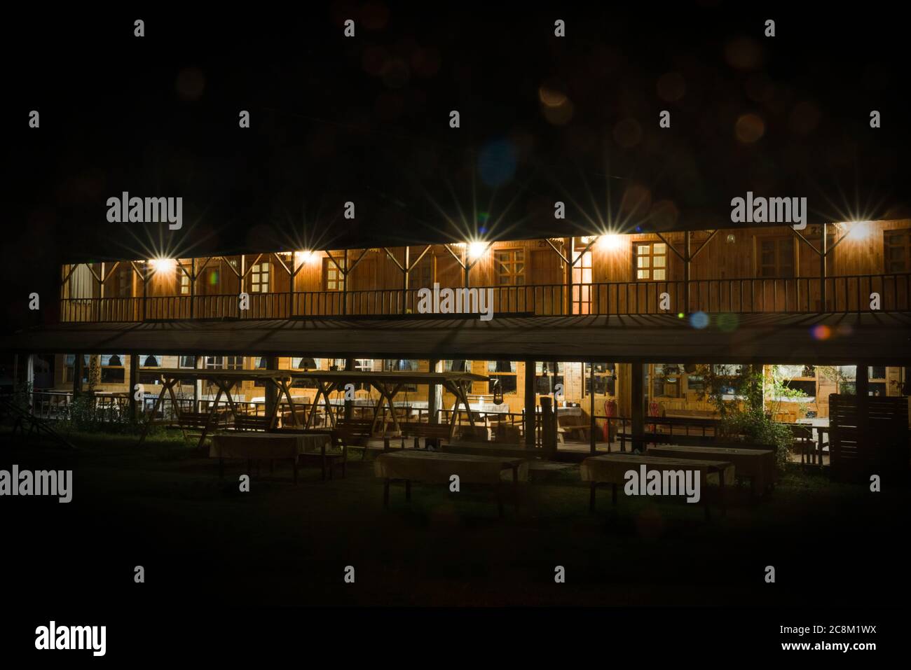 Two-storey motel made of wood in at night. Farm homes. Plateau tourism. Daday, Kastamonu, Turkey. Stock Photo
