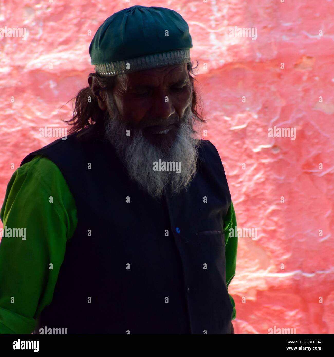 New Delhi India – March 13 2020 : Man Inside Hazrat Nizamuddin Dargah during the day time in Delhi India, Religious Darah of Nizamuddin in Delhi durin Stock Photo