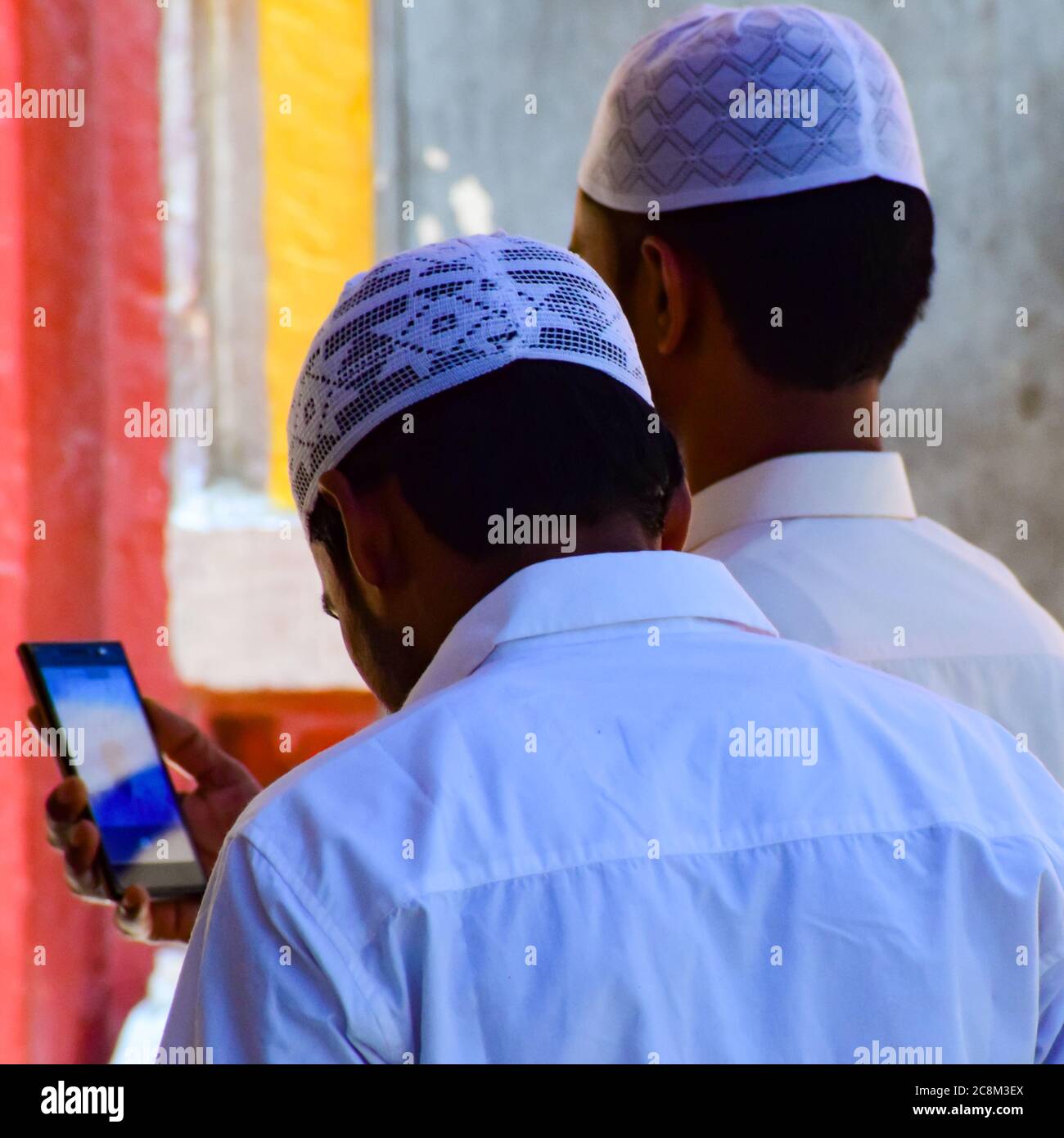 New Delhi India – March 13 2020 : Man Inside Hazrat Nizamuddin Dargah during the day time in Delhi India, Religious Darah of Nizamuddin in Delhi durin Stock Photo