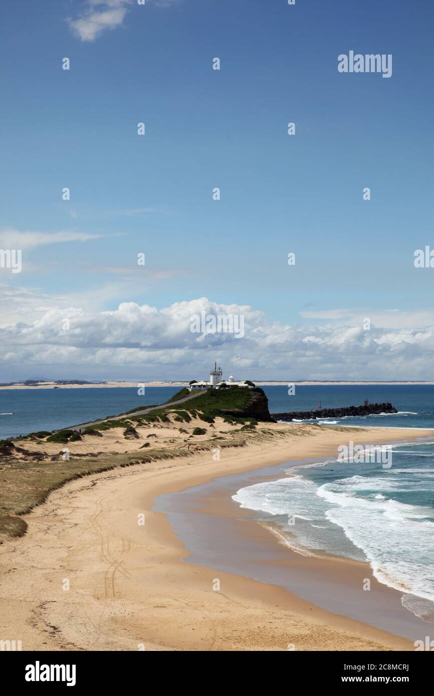 A beautiful sunny day at Nobbys Beach and Lighthouse. Newcastle Australia. Popular local attraction. Stock Photo