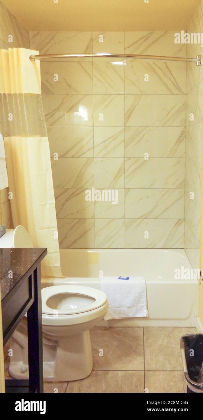 Hotel Bathroom Sink and Bathtub Stock Photo
