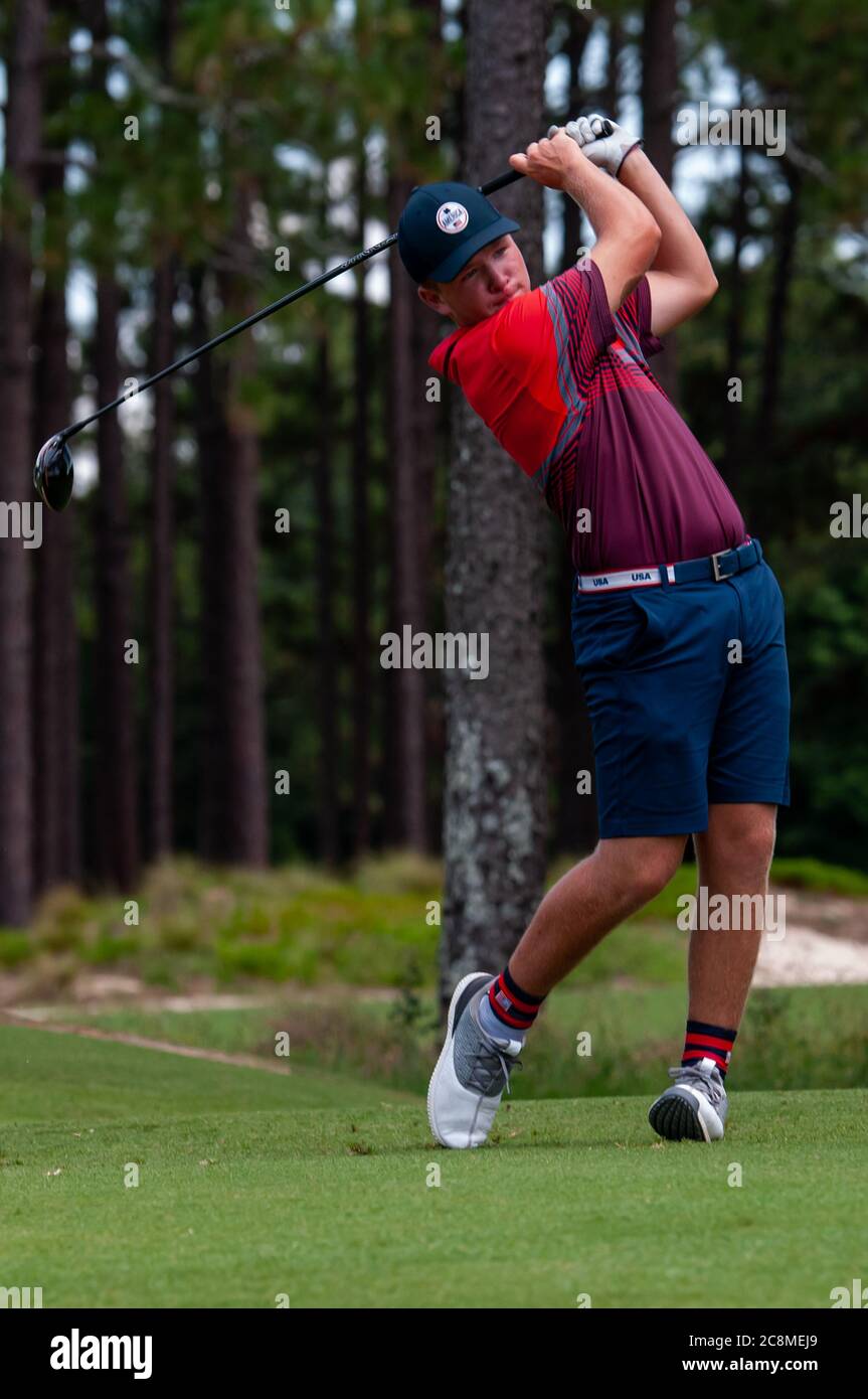 Village Of Pinehurst, North Carolina, USA. 25th July, 2020. TYLER JONES, of Jacksonville, North Carolina, plays his shot from the 18th tee during the final round of the U.S. Kids Golf World Teen Championship (Boys 15-18) at the famed Pinehurst No. 2, in the Village of Pinehurst, North Carolina. Each year, the World Teen Championship welcomes golfers ages 13Ã‘18 to seven championship courses in the Pinehurst area. These courses, this event, and the community as a whole have provided a stage for golfÃs next generation of stars to shine. Credit: ZUMA Press, Inc./Alamy Live News Stock Photo