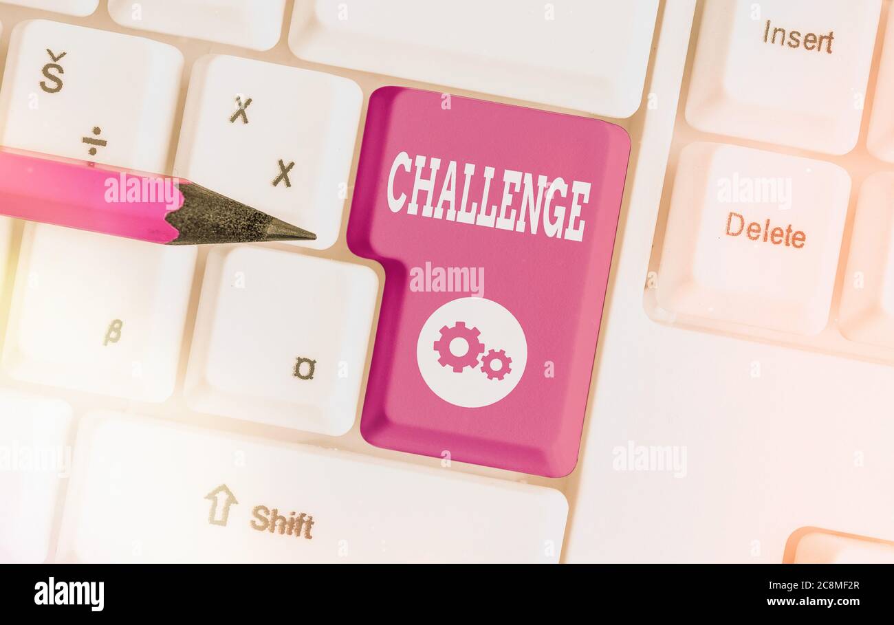 Writing note showing Challenge. Business concept for process of provoking or testing physiological activity by exposure Colored keyboard key with acce Stock Photo
