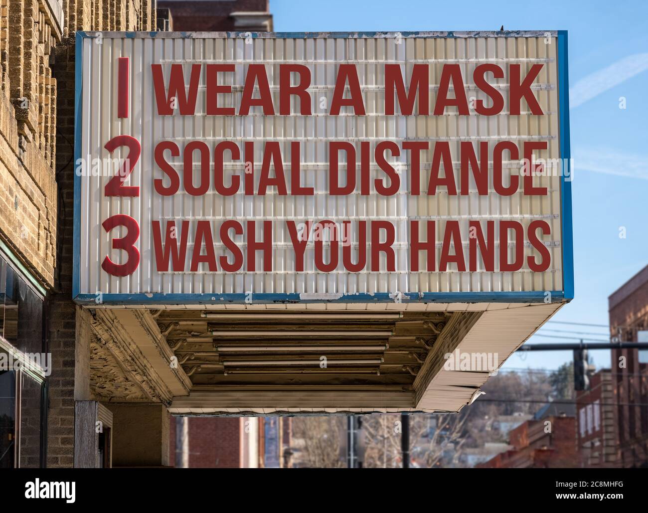 Mockup of movie cinema billboard with wear a mask, social distance and wash hands to deal with the coronavirus epidemic. Stock Photo