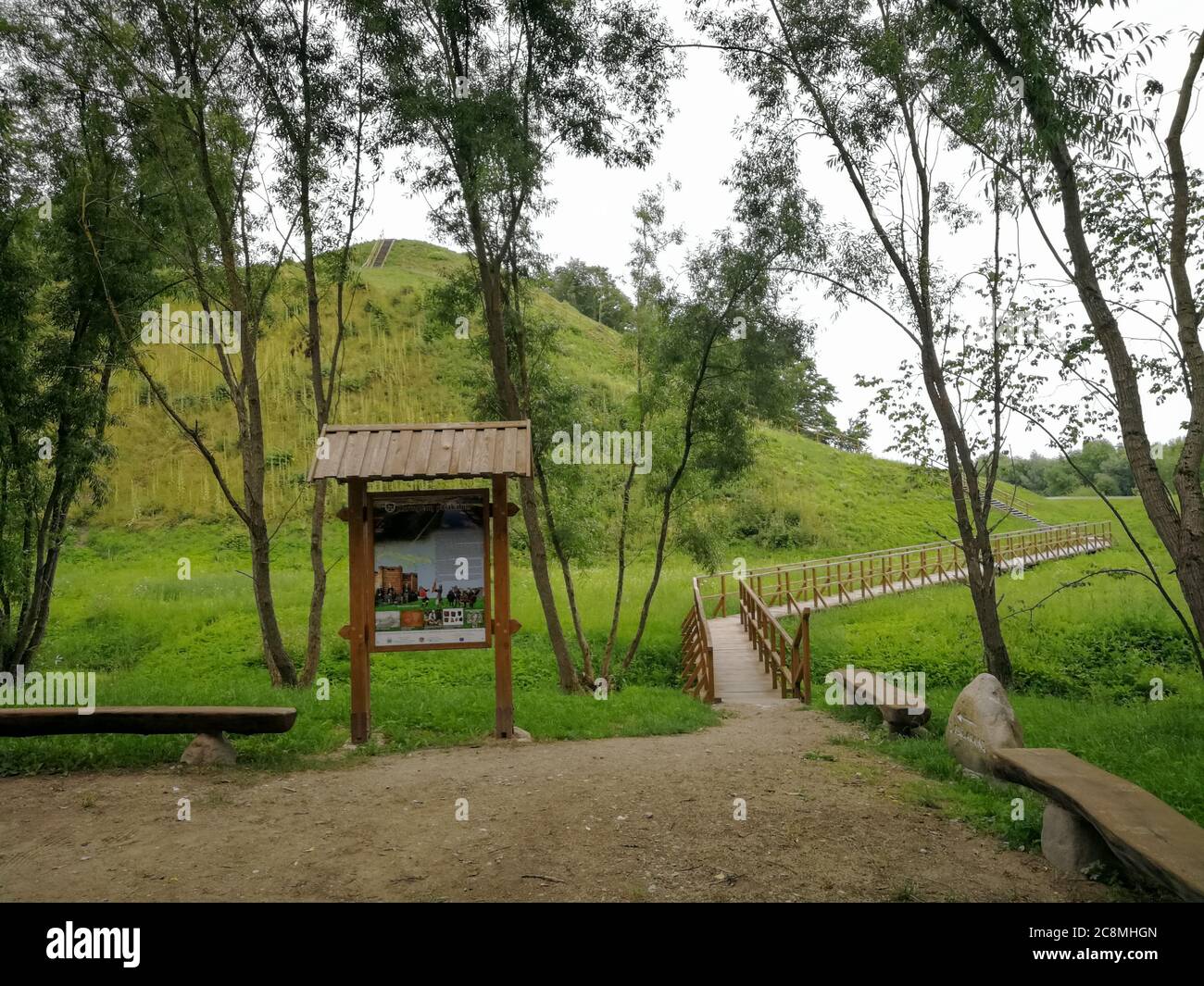 Kartupenai mound with wooden stairs and information board Stock Photo