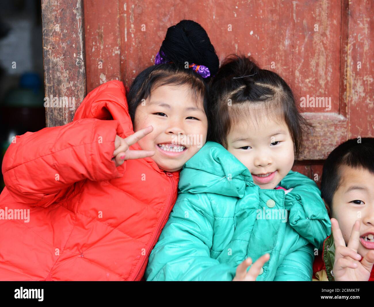 Miao children posing for a photo in Guizhou, China. Stock Photo