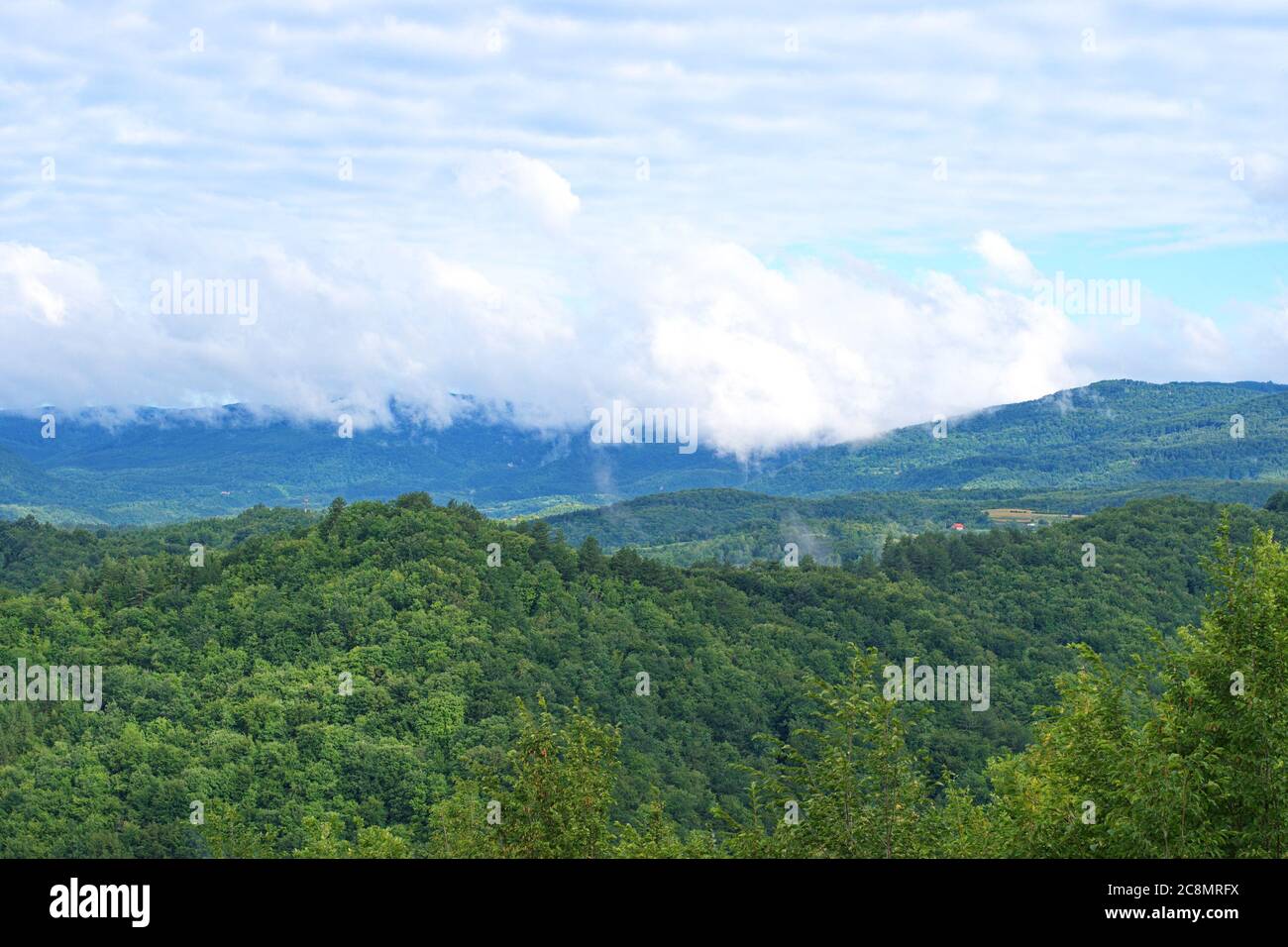 Fog over hills hi-res stock photography and images - Alamy