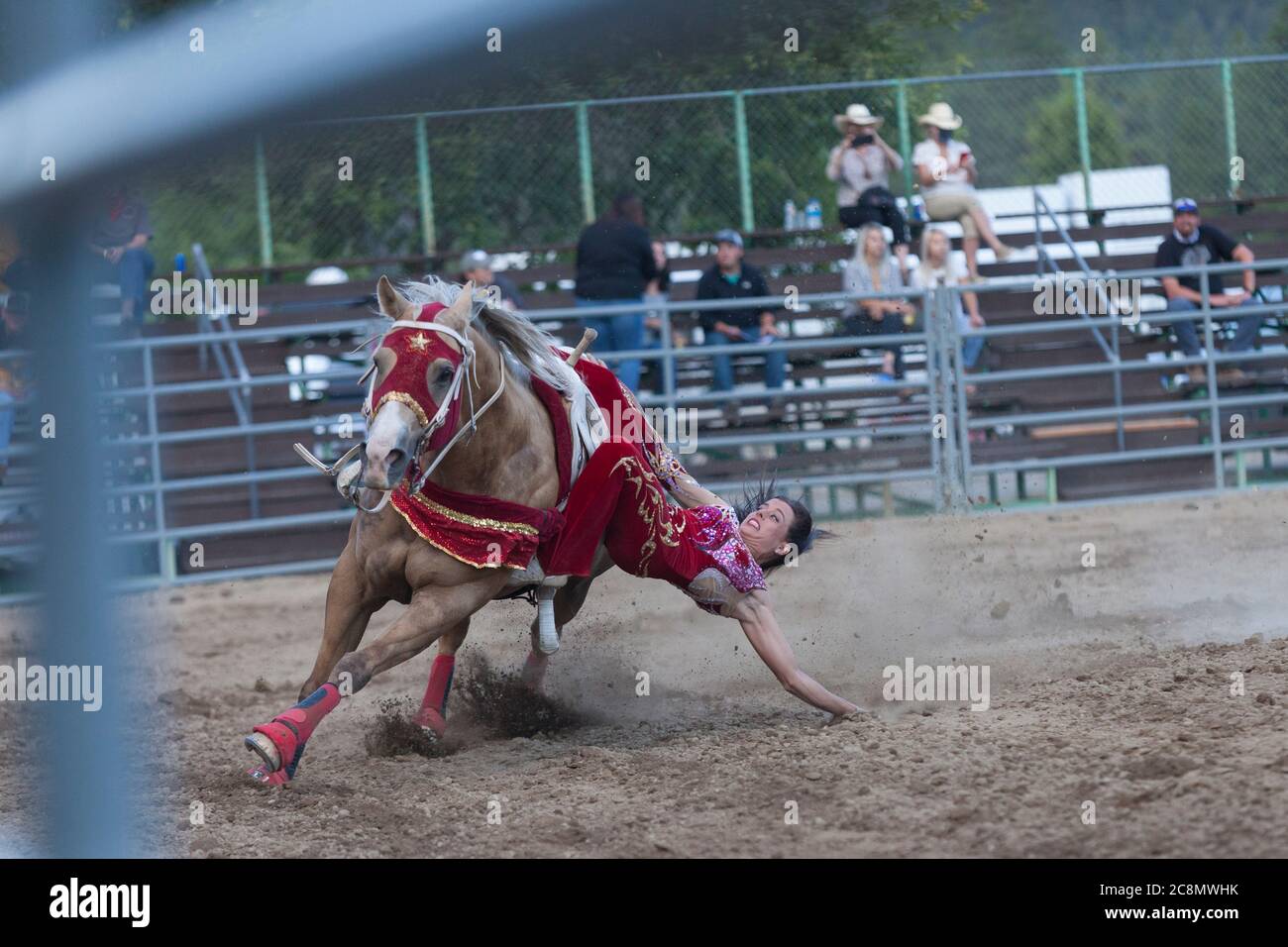 Cowboys compete in the team roping event at the Kootenai River Stampede