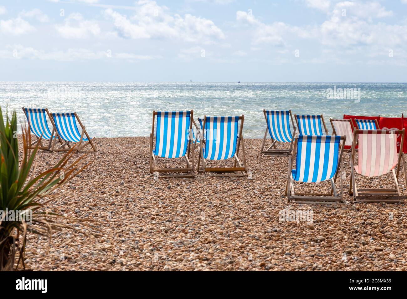 Striped fabric deck chairs hi-res stock photography and images - Alamy