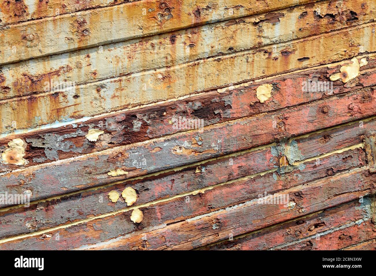 texture background wall of a rusty ship with wooden lines Stock Photo