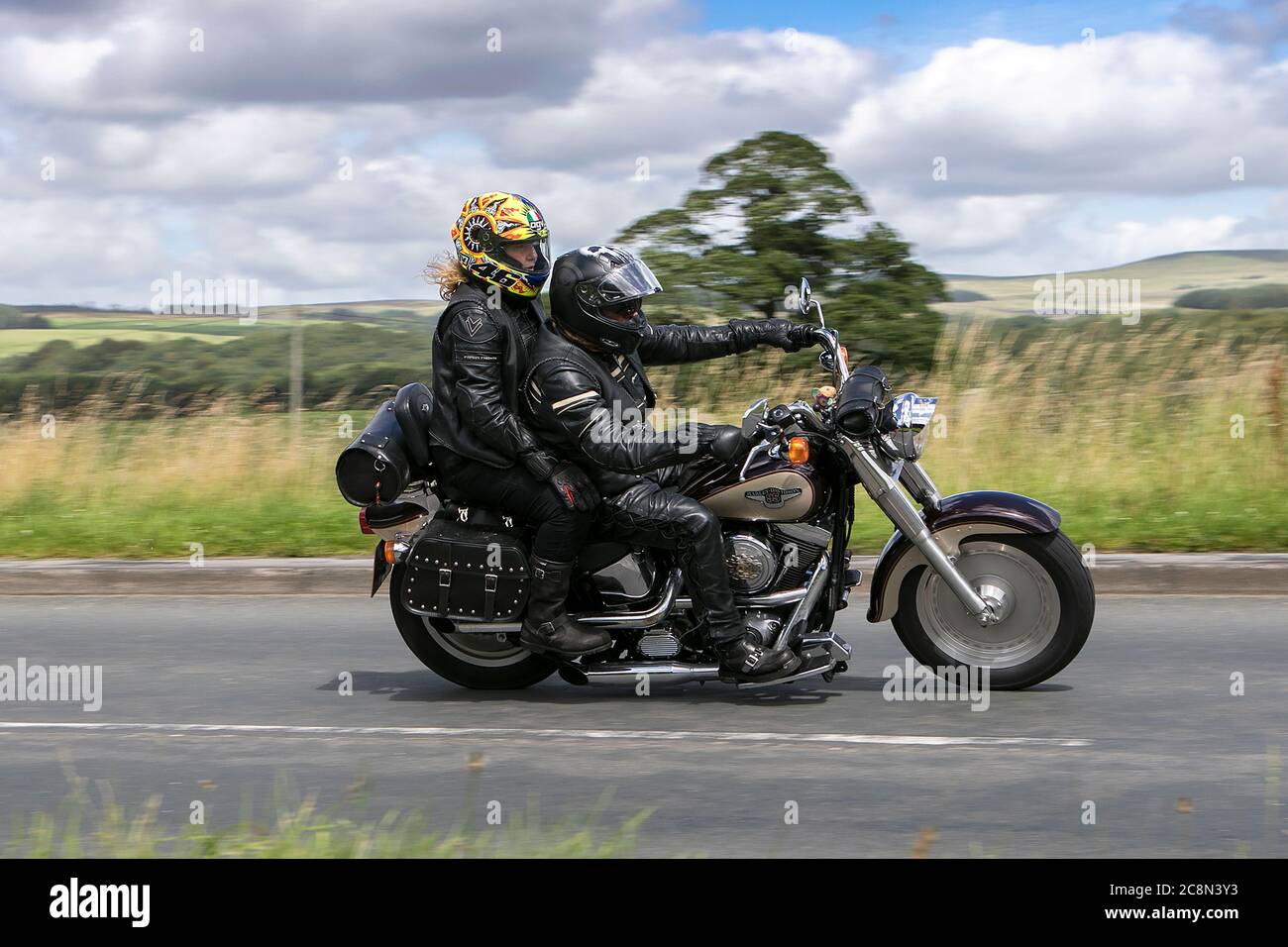 Harley davidson Motorbike rider; two wheeled transport, motorcycles, vehicle, roads, motorbikes, bike riders motoring in Chorley, UK Stock Photo