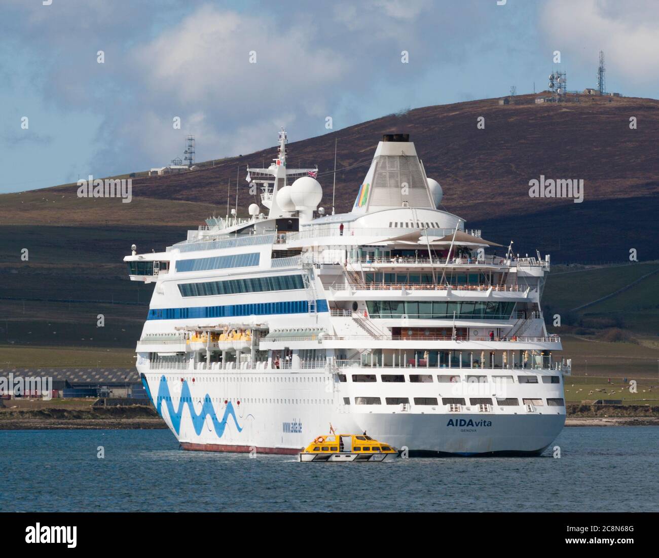 Cruise ship AIDAvita conducting tendering operations in Kirkwall Bay, Orkney, Scotland Stock Photo