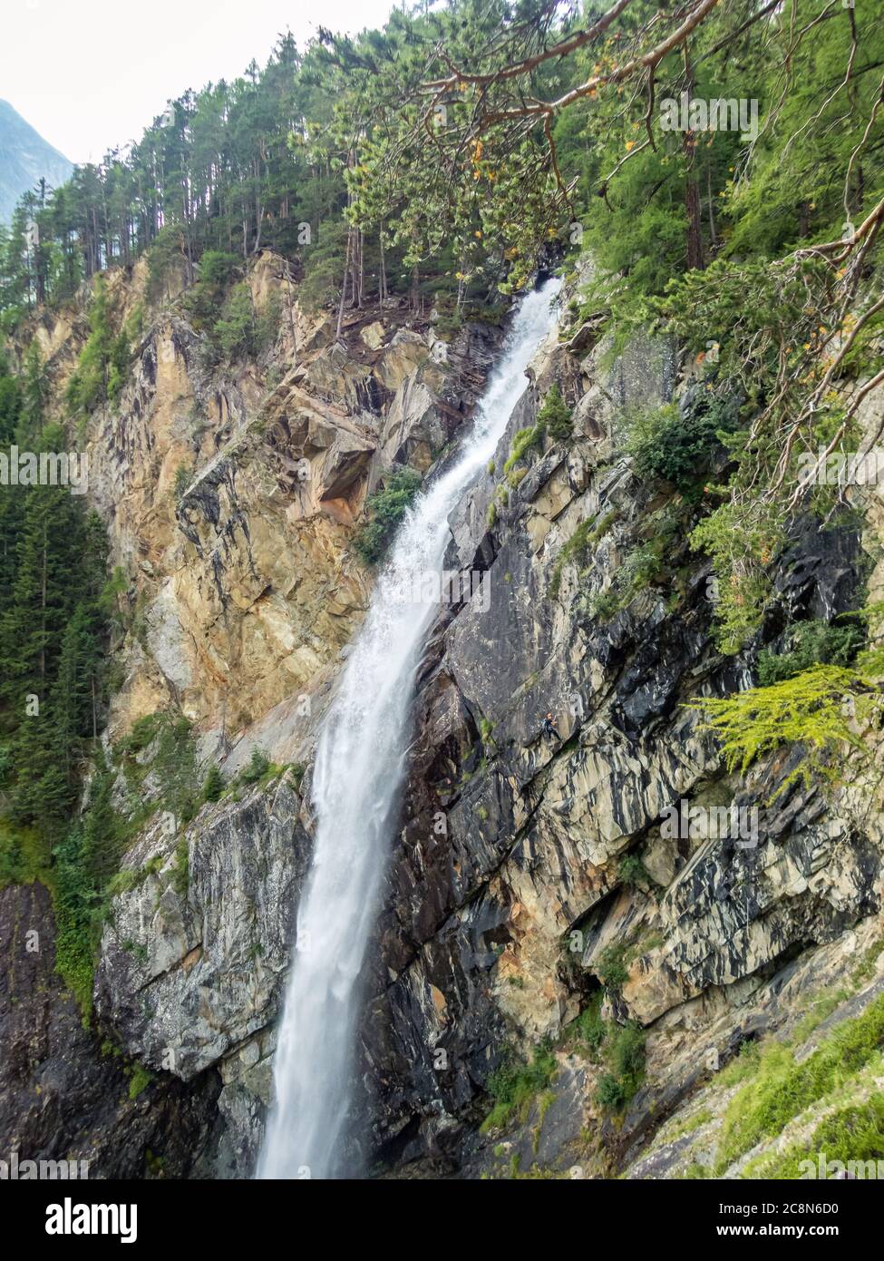 Climbing at the Lehner Waterfall via ferrata near Oberried in the Otztal, Tyrol, Austria Stock Photo