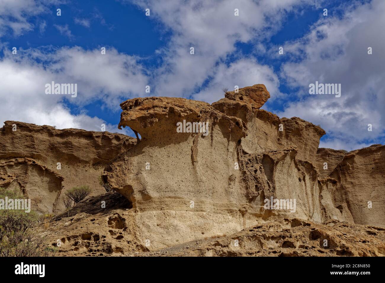 Eroded Volcanic ash and breccia rock deposits forming dramatic Cliffs in a nature Reserve in Tenerife. Stock Photo