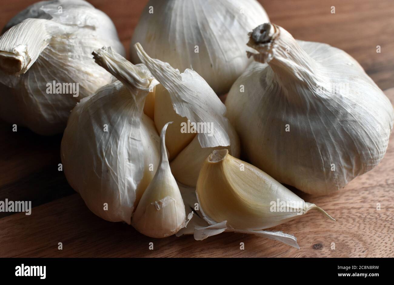 Image of Imported Spanish Garlic bulbs with loose cloves close up on a