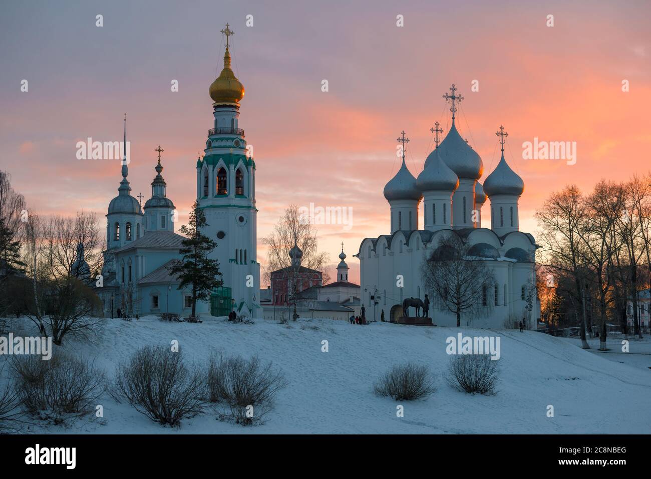 Temples of the Vologda Kremlin against the backdrop of March sunset. Vologda, Russia Stock Photo