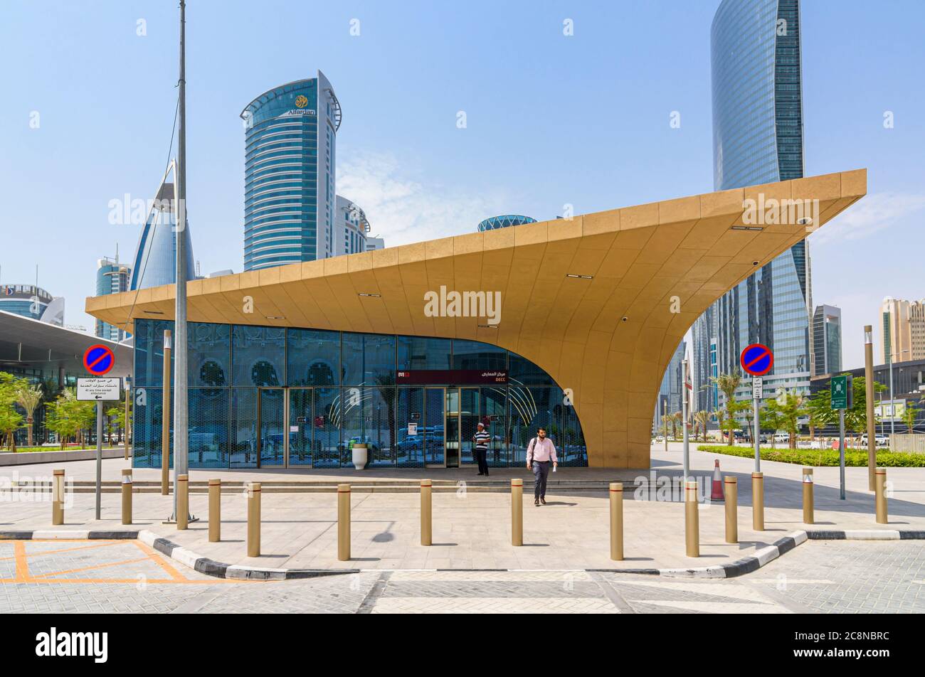 DECC Doha Metro station entrance looking towards the skyscrapers of the West Bay area, Doha, Qatar Stock Photo
